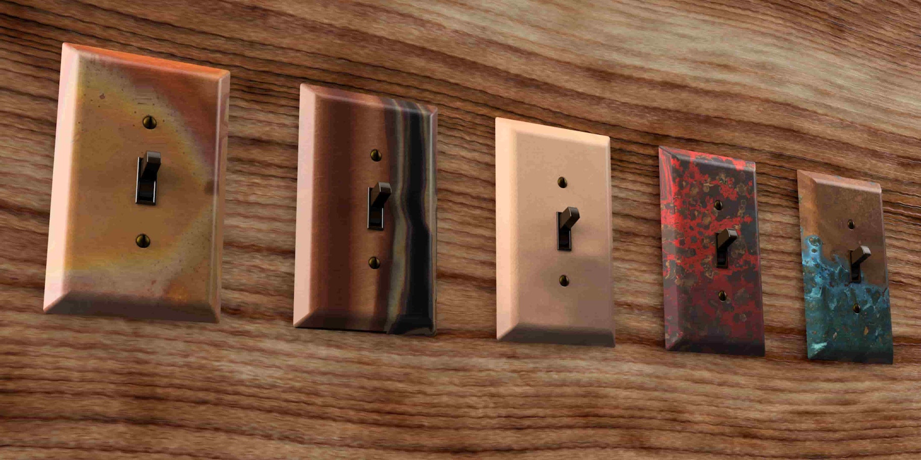 A picture of five different copper wallplates